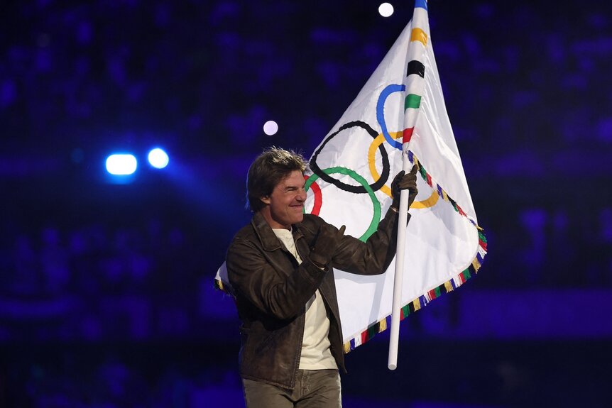 See Tom Cruise's Action-Packed Closing Ceremony Appearance | NBC Insider