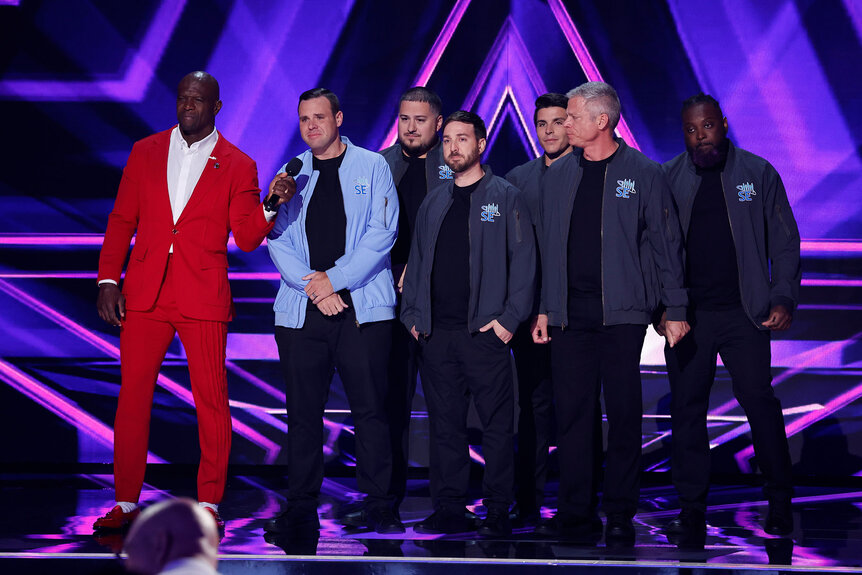 Terry Crews and Sly Elements onstage during season 19, episode 17 of America's Got Talent.