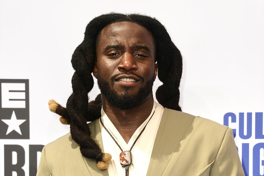 Shaboozey poses on the carpet of the 2024 BET Awards