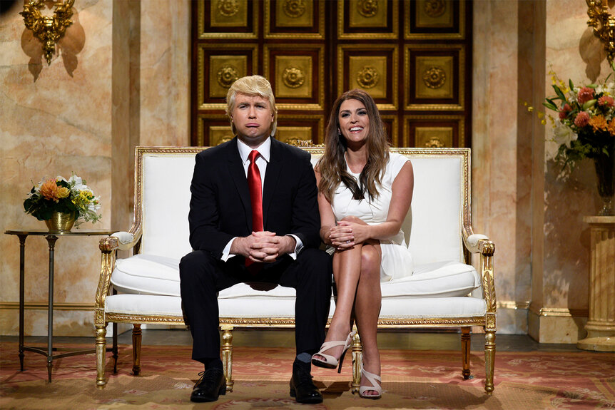 Taran Killam as Donald Trump and Cecily Strong as Melania Trump during a sketch on SNL