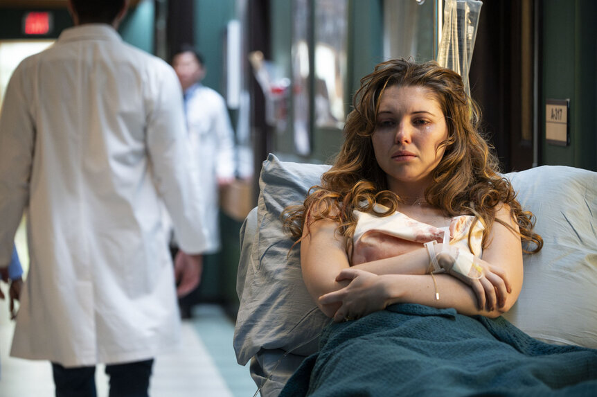 Bridget (Samantha Hanratty) laying in a hospital bed in Brilliant Minds Season 1, Episode 4.