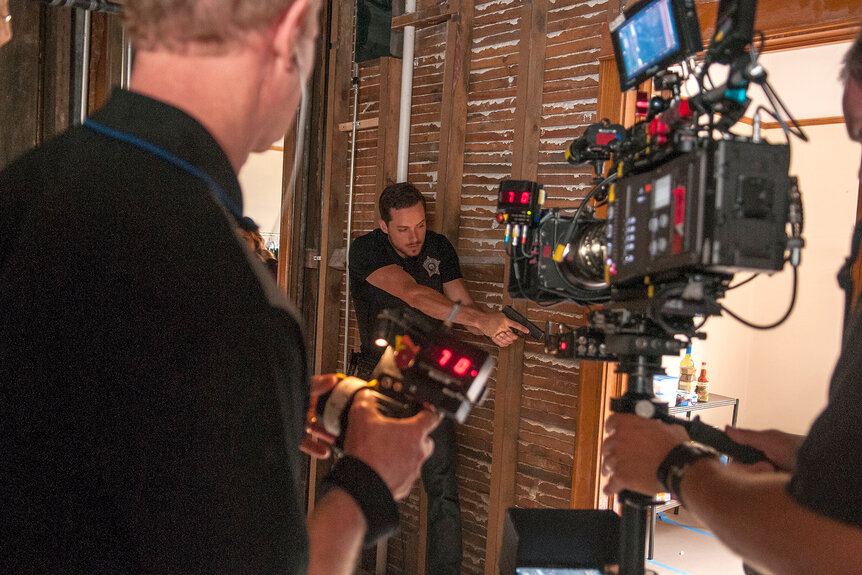 A camera man films Jesse Lee Soffer as Jay Halstead on Chicago P.D Season 3 Episode 2