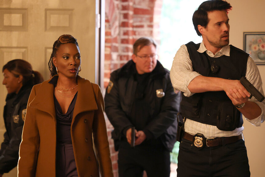 Gabi and Detective Mark Trent walk into a house on Found Season 2 Episode 2.