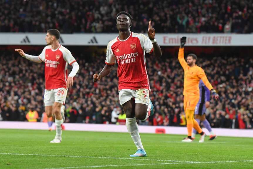 Bukayo Saka of Arsenal celebrates scoring his team's first goal.