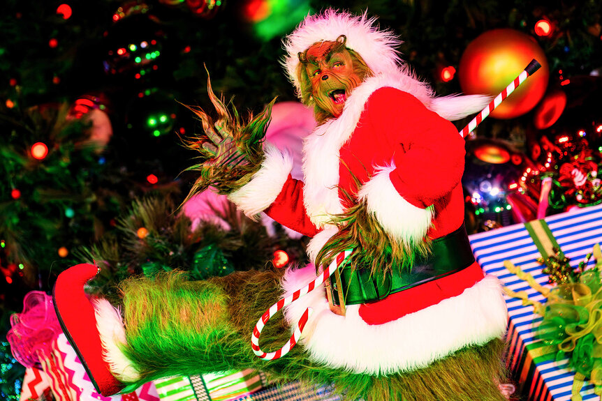 The grinch dressed as Santa at Holidays at Universal Studio Hollywood