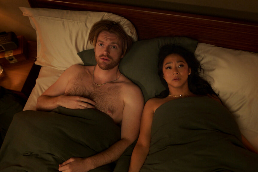 Jason and Ruby lay in bed together on Laid Season 1 Episode 1