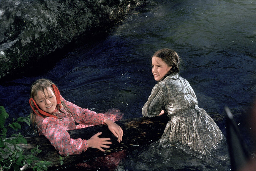 Alison Arngrim as Nellie Oleson and Melissa Gilbert as Laura Ingalls Wilder in Little House on the Prairie.