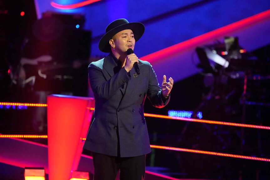 Sofronio Vasquez performs onstage on The Voice Season 26 Episode 10.