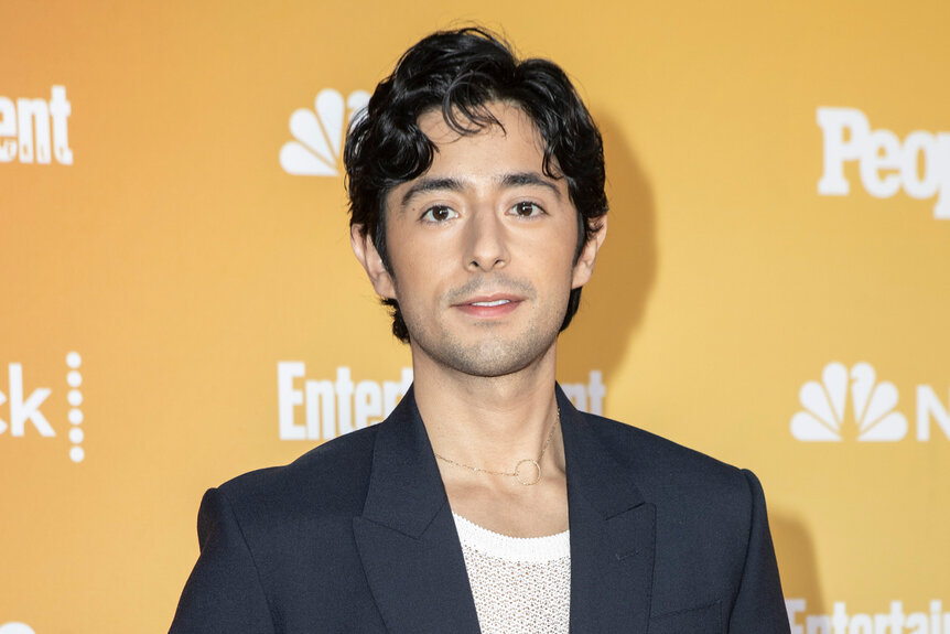 Pablo Castelblanco wears a black blazer and white shirt on the red carpet