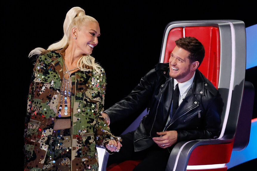 Michael Bublé and Gwen Stefani laugh on stage on The Voice Season 26 Episode 4