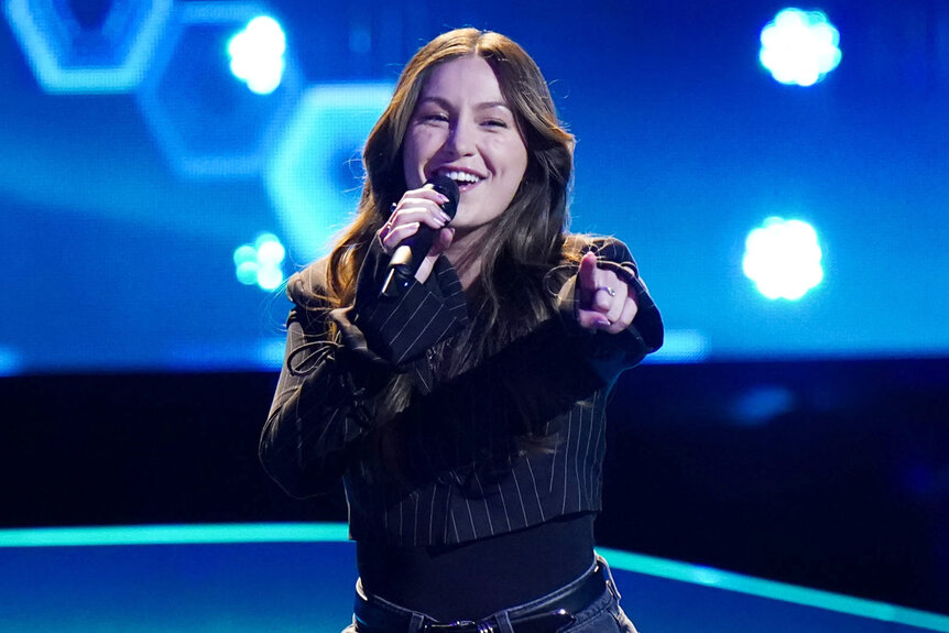 Camryn Brooks performs on stage on The Voice Season 26 Episode 5