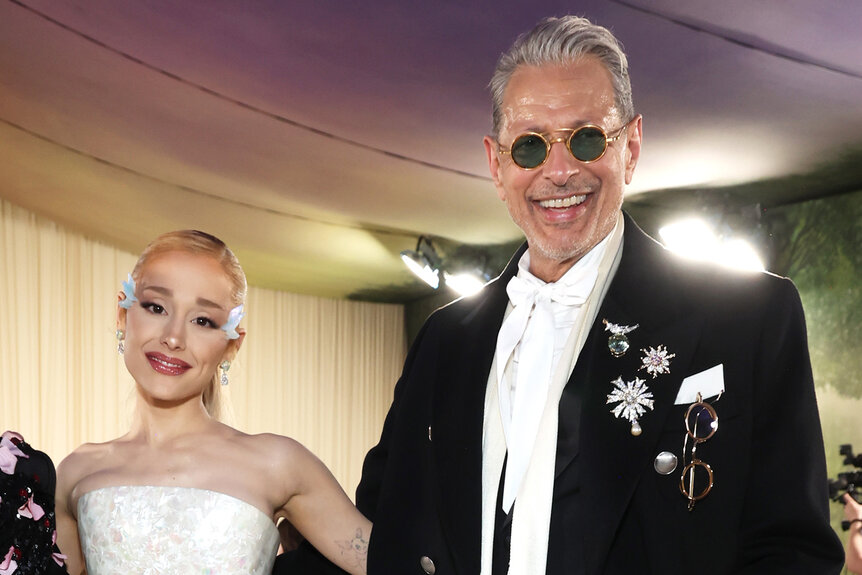 Ariana Grande and Jeff Goldblum pose together on the red carpet at the met gala