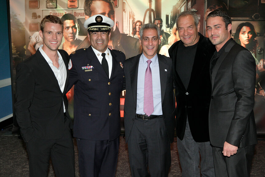 Mayor of Chicago, Rahm Emanuel poses with cast members of Chicago Fire for the world premiere of Chicago Fire in 2012