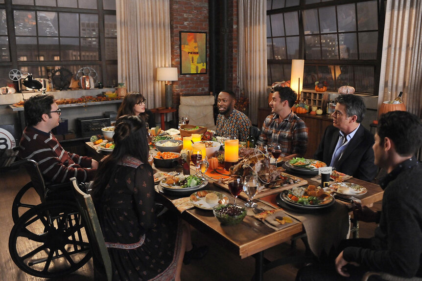 Guest star Nelson Franklin, Zooey Deschanel, Lamorne Morris, Jake Johnson, guest star Peter Gallagher and Max Greenfield in the "ThanksGavin" episode of New Girl.