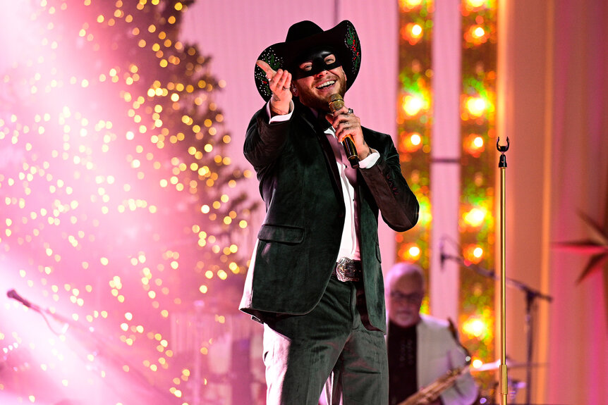 Orville Peck sings on stage during Little Big Town’s Christmas at the Opry