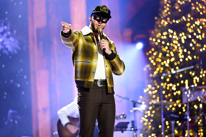 Orville Peck sings on stage during Little Big Town’s Christmas at the Opry