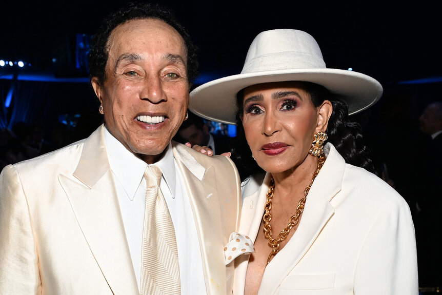 Smokey Robinson and Frances Gladney both wear white to an Academy Awards Viewing Party