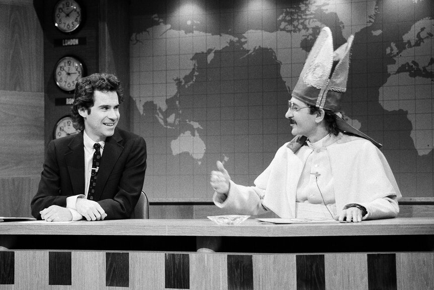 Dennis Miller and Don Novello during the 'Weekend Update' on Saturday Night Live Season 11