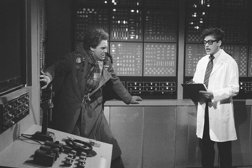 John Lithgow and Robert Downey Jr during a sketch on Saturday Night Live Season 11