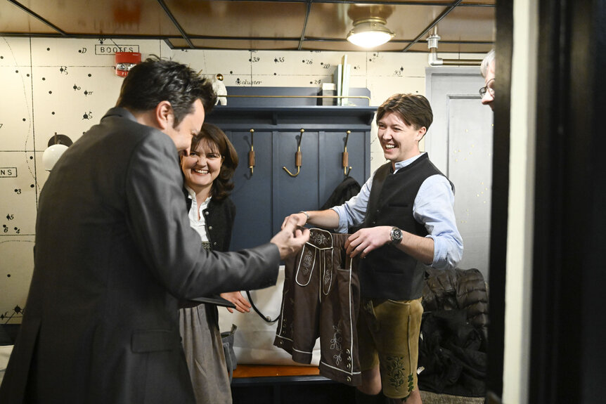 Jimmy Fallon talking and looking at shorts with the Ewerdwalbesloh family.