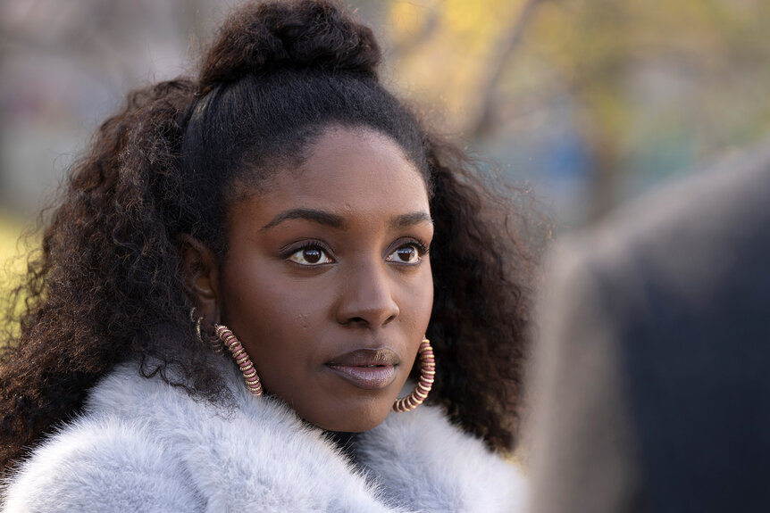 Vanessa Washington (Karen Chinasa Obilom) wears hoop earrings and white coat on Law and Order Season 24, Episode 10.